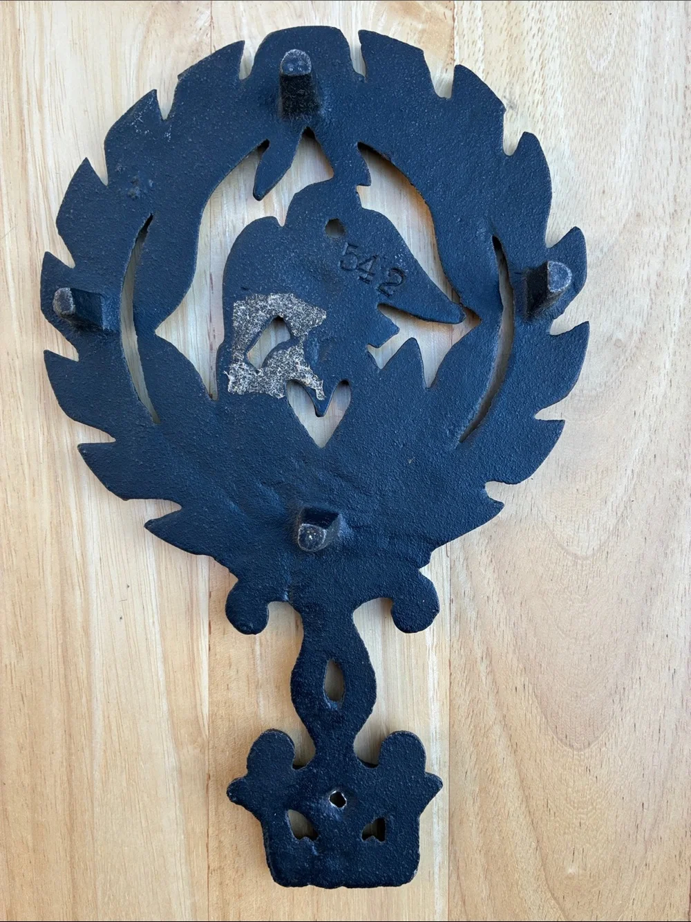 Cast Iron trivet. Eagle. Heart leaves vintage